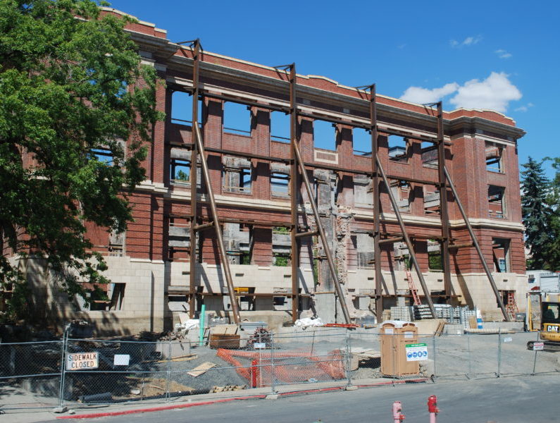 Construction and restoration of original brick facade