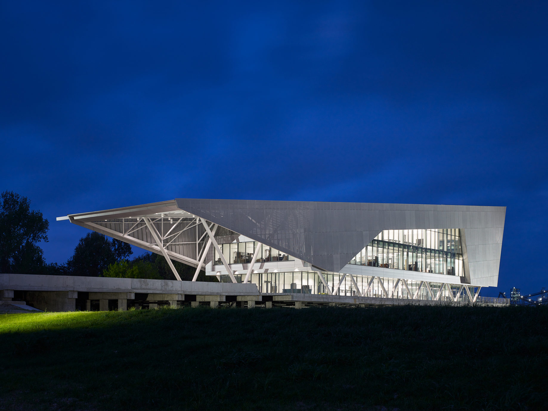 View of north side at night illuminated by interior lights