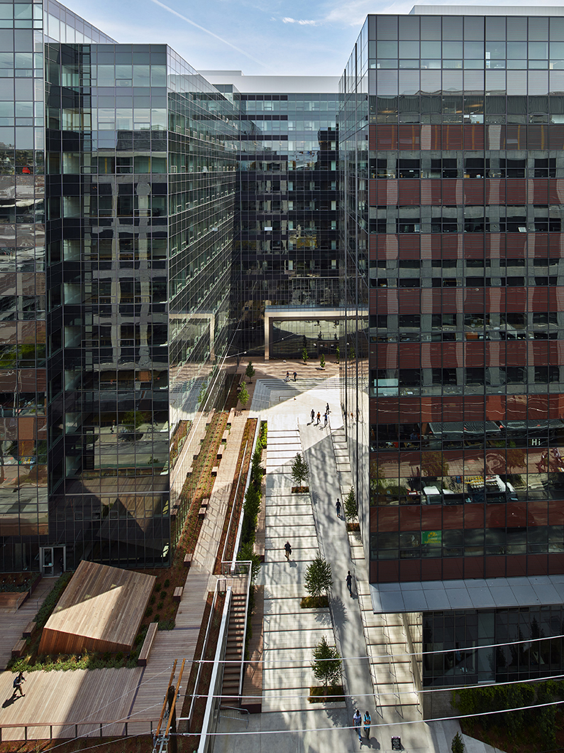 Aerial view of exterior courtyard and roof-deck to the left