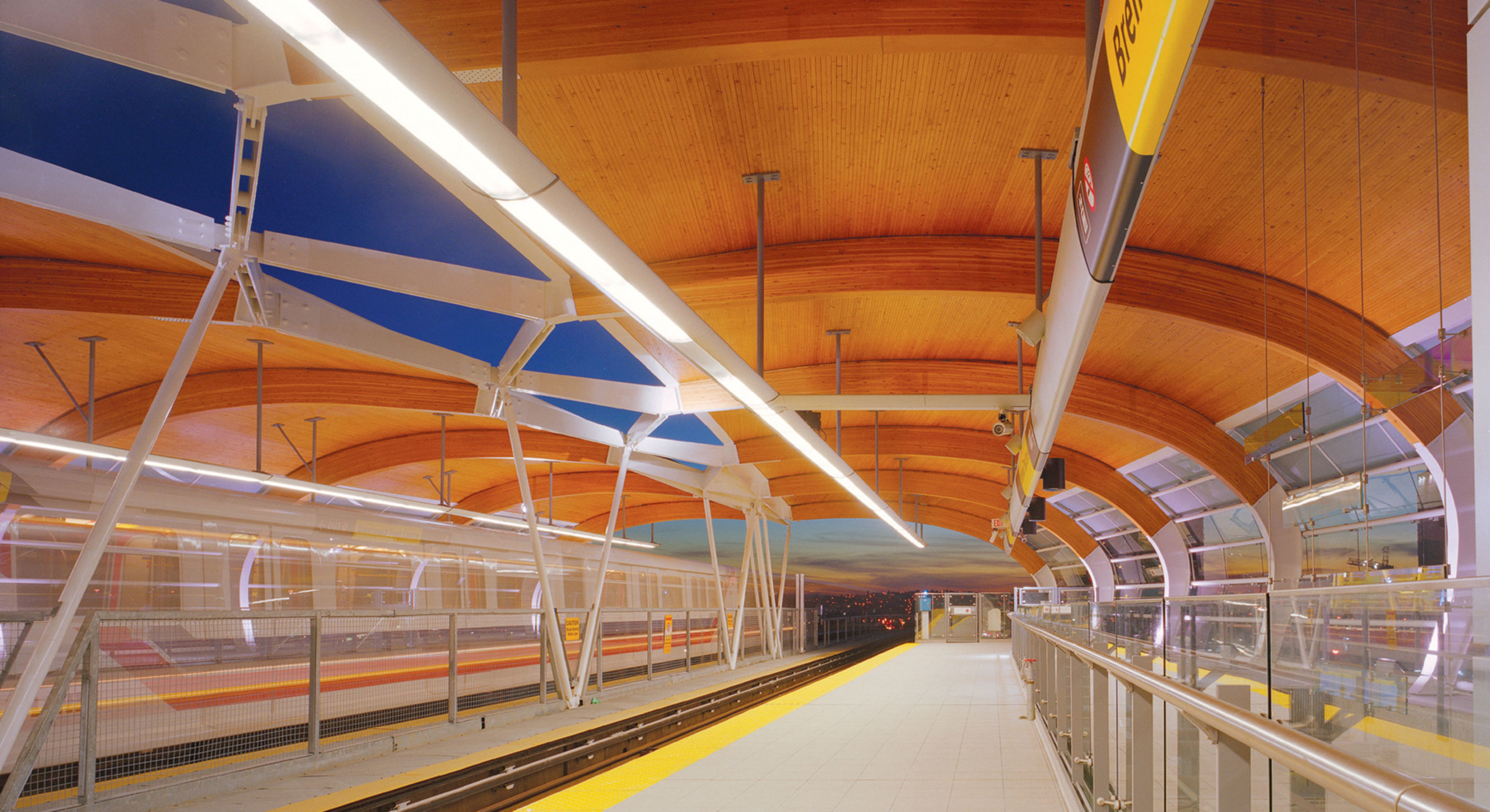 Brentwood station platform showing wood roof.