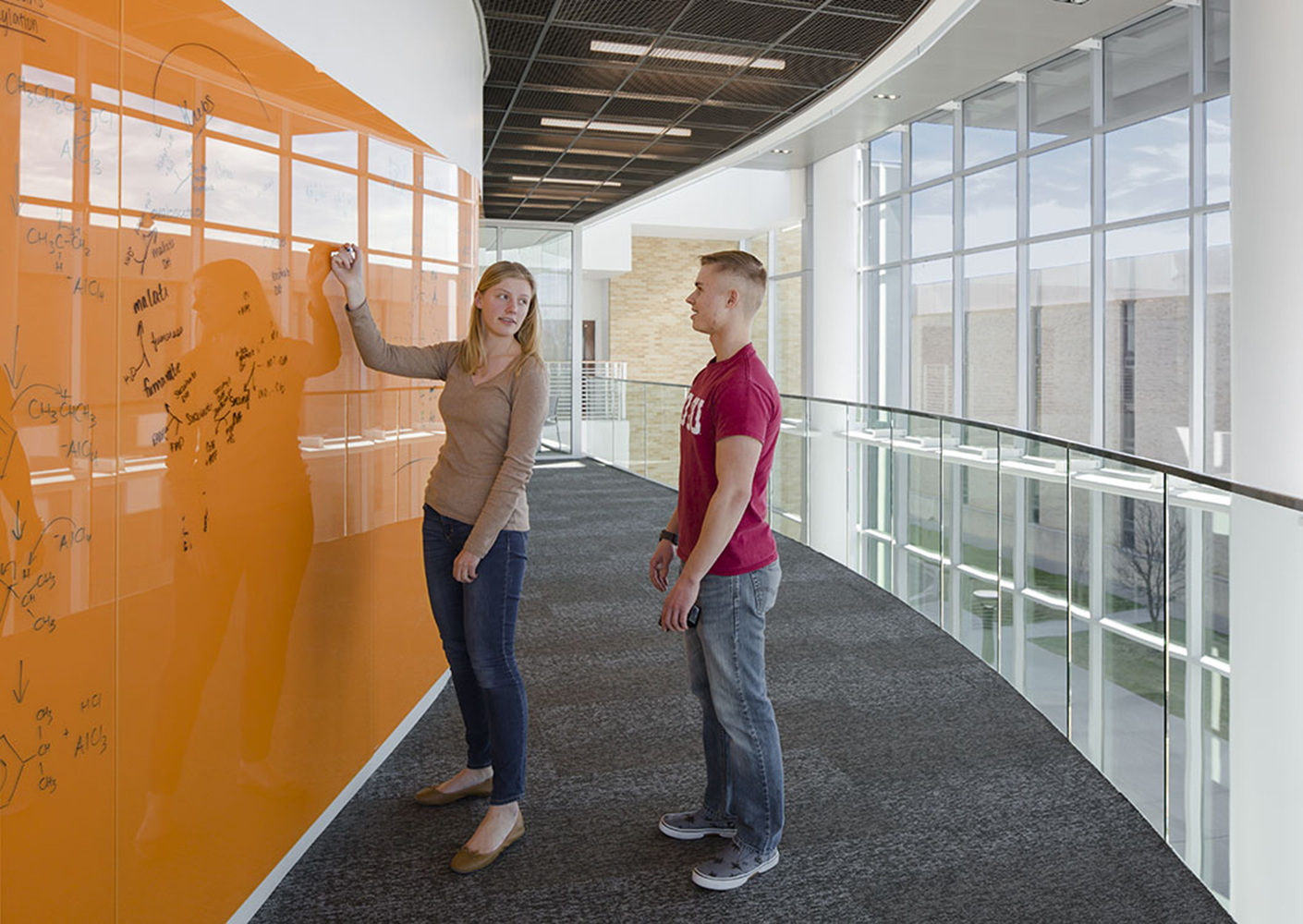 Students Drawing on Marker Board