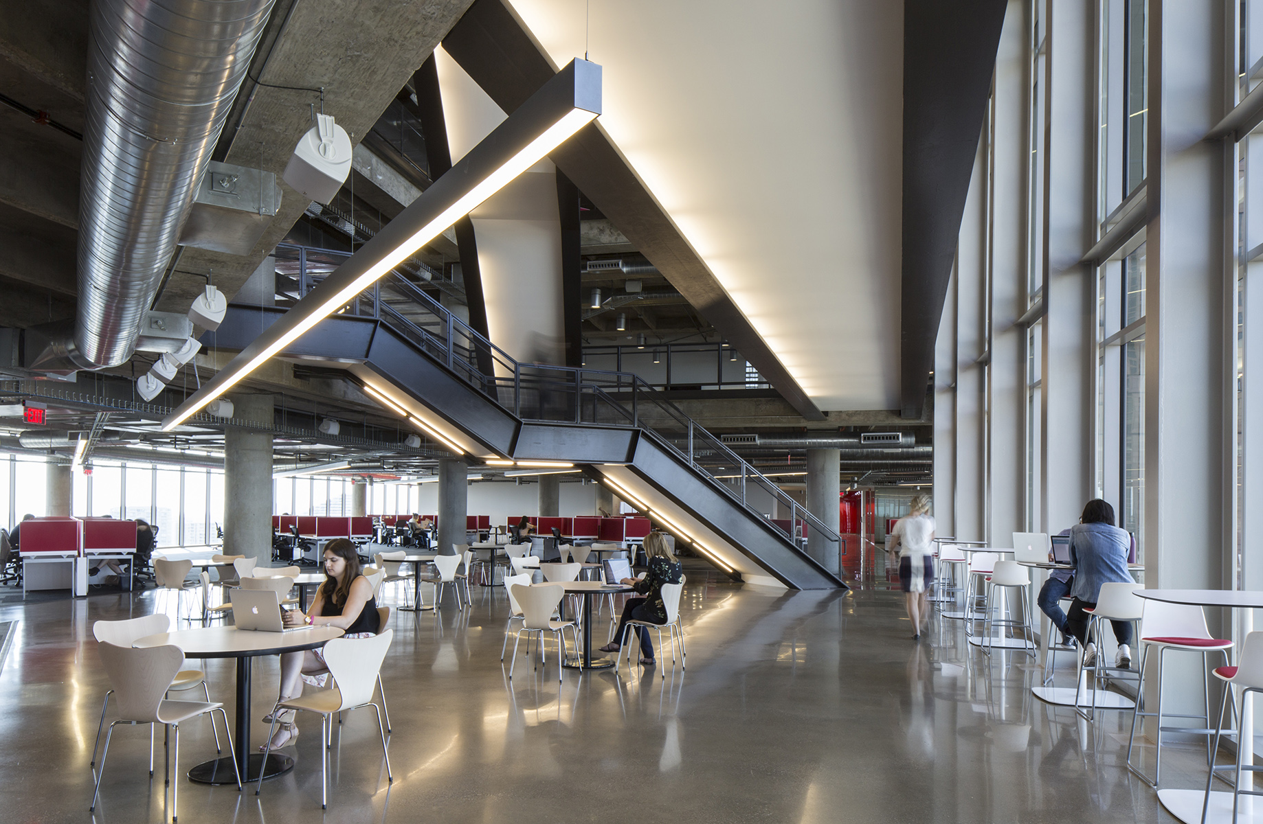 People Working in 3 story atrium