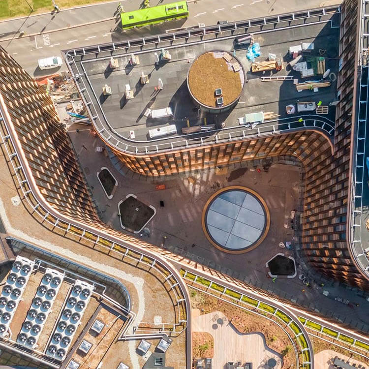 Aerial photo showing a green roof and an oculus at VIA in downtown Oslo.