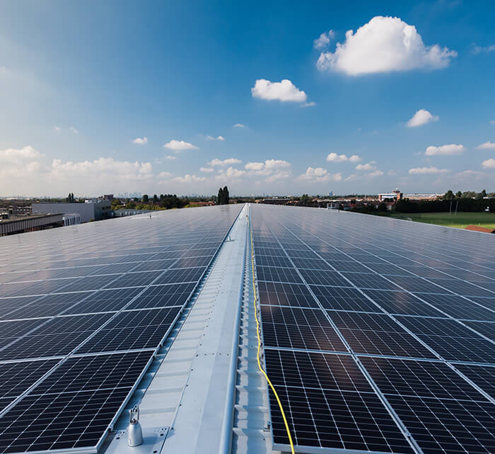 Photo of rooftop solar panels atop PEARL, the Person-Environment-Activity Research Laboratory