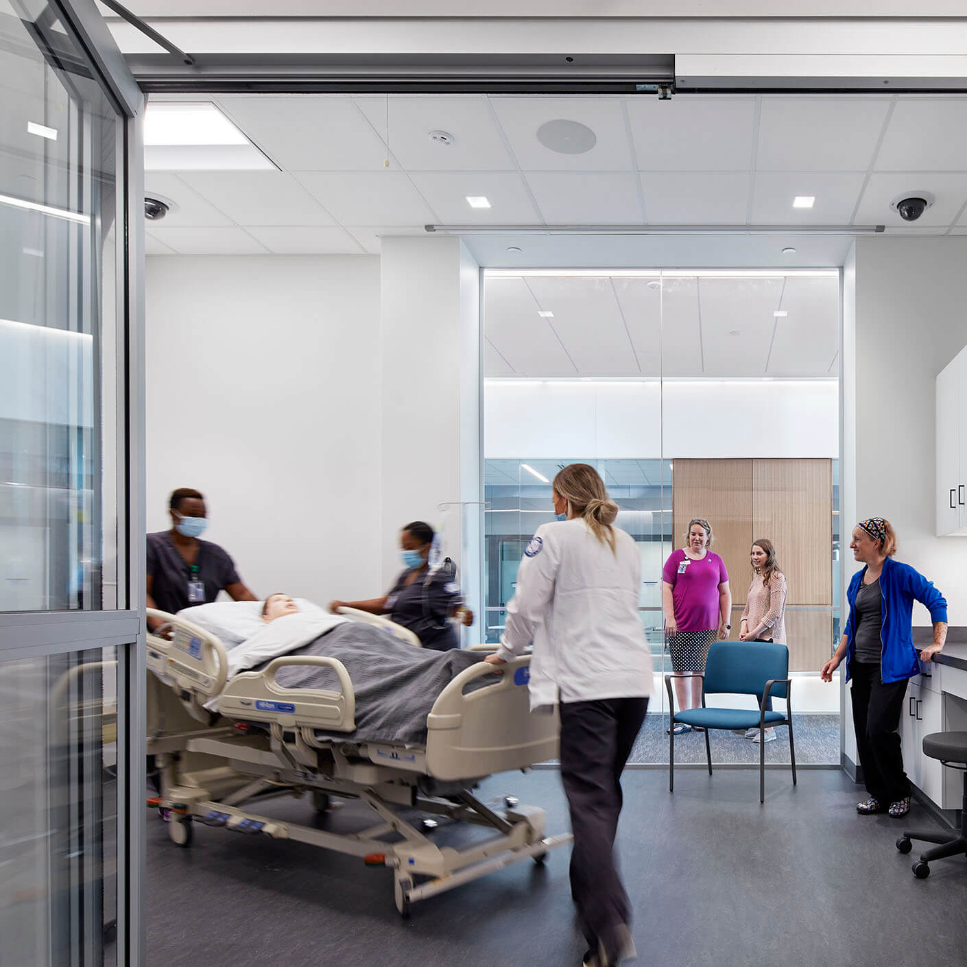 Photo showing health sciences students conducting a medical simulation