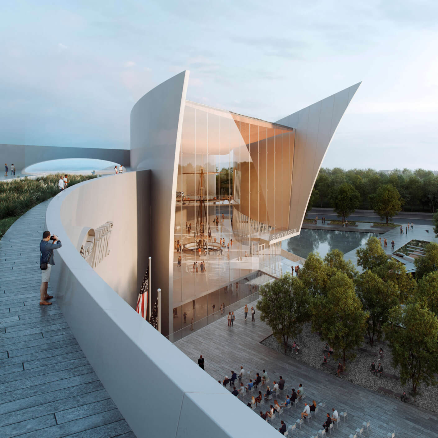Scattered with macro artifacts and balanced gracefully alongside a reflecting pool, this gathering area is a tribute to active and veteran Navy, family members, and community.