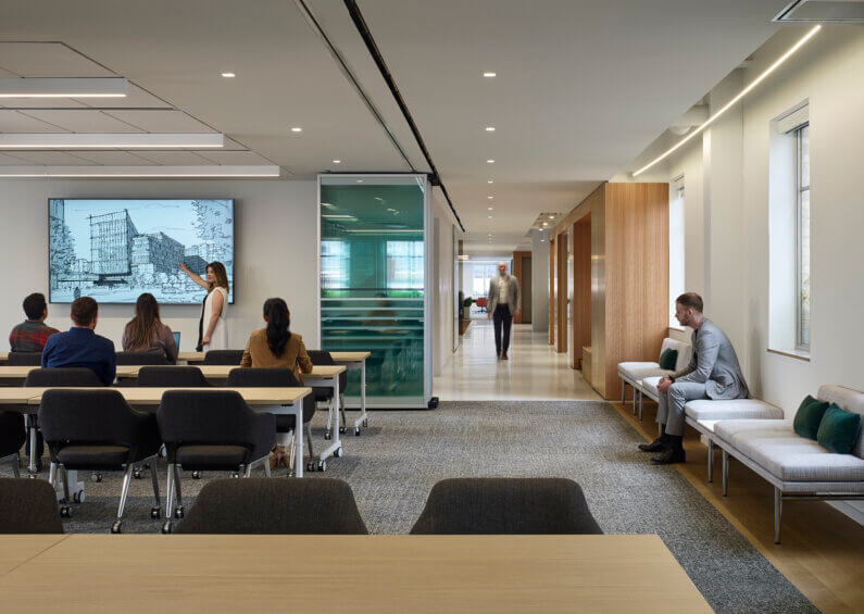 A meeting space with staff members.