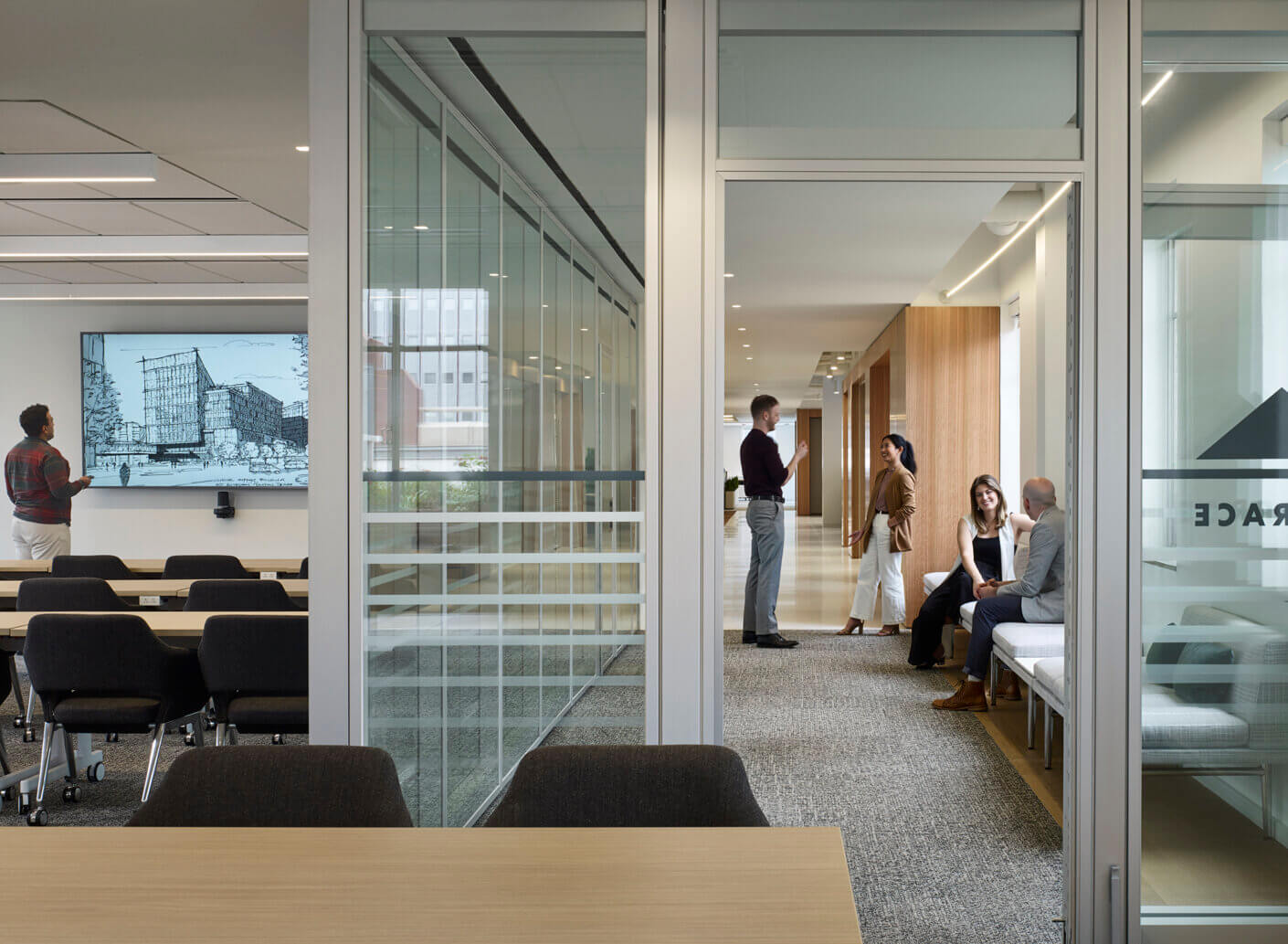A meeting space with staff members.