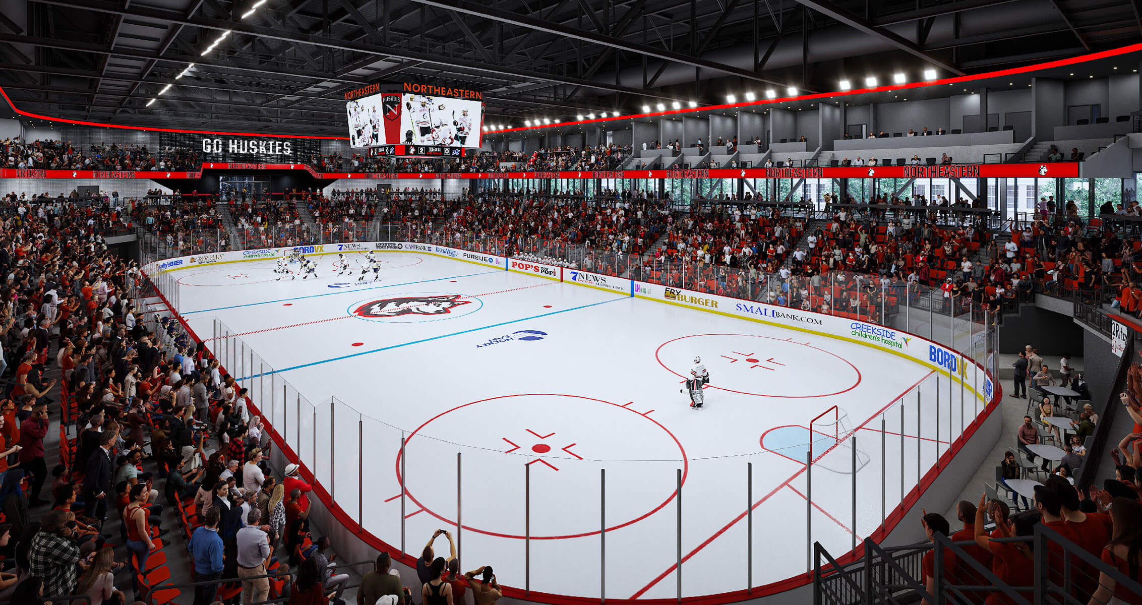 Interior view of a hockey arena, featuring a full ice rink, seating for fans, and a bustling crowd with team branding displayed prominently.