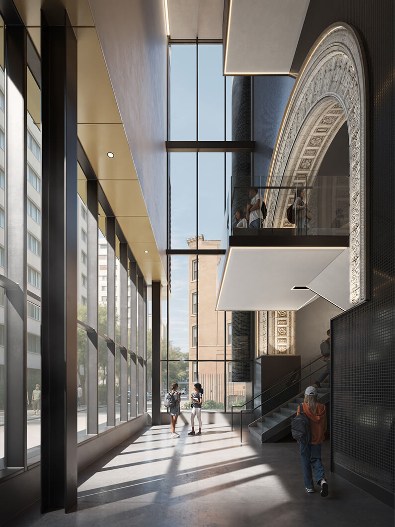 Interior view of a spacious lobby with a historic arch and large windows, showcasing architectural details and people engaging in conversation and movement.