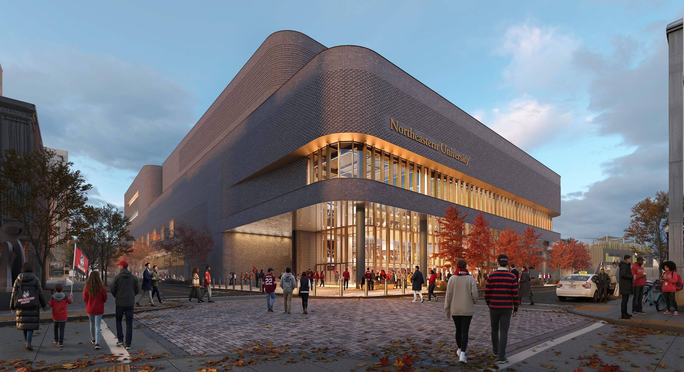 Rendering of new multipurpose facility at Northeastern University with a large glass entryway, surrounded by trees and pedestrians during autumn.