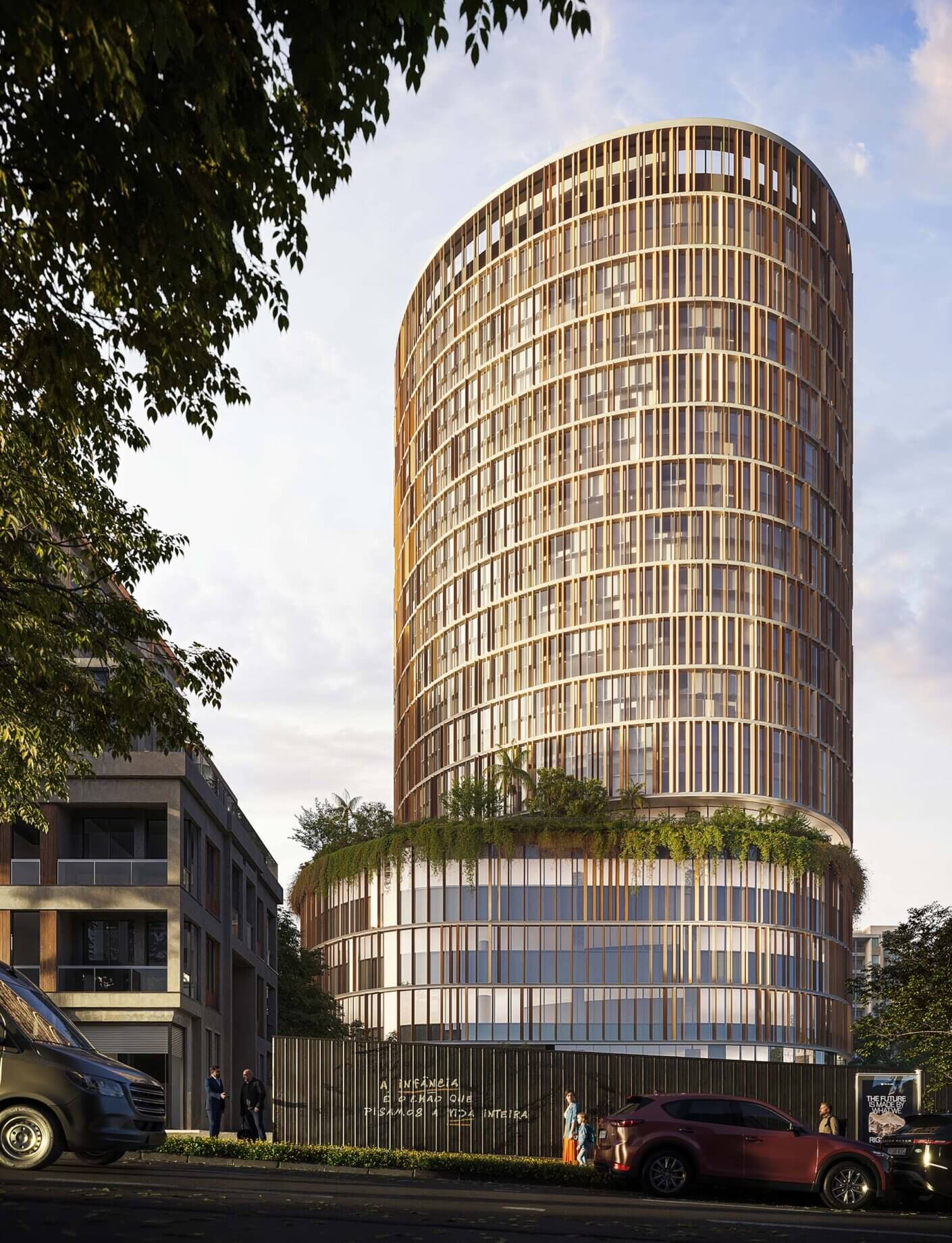 Render of a modern cylindrical building with vertical lines under clear sky, surrounded by trees and parked cars.