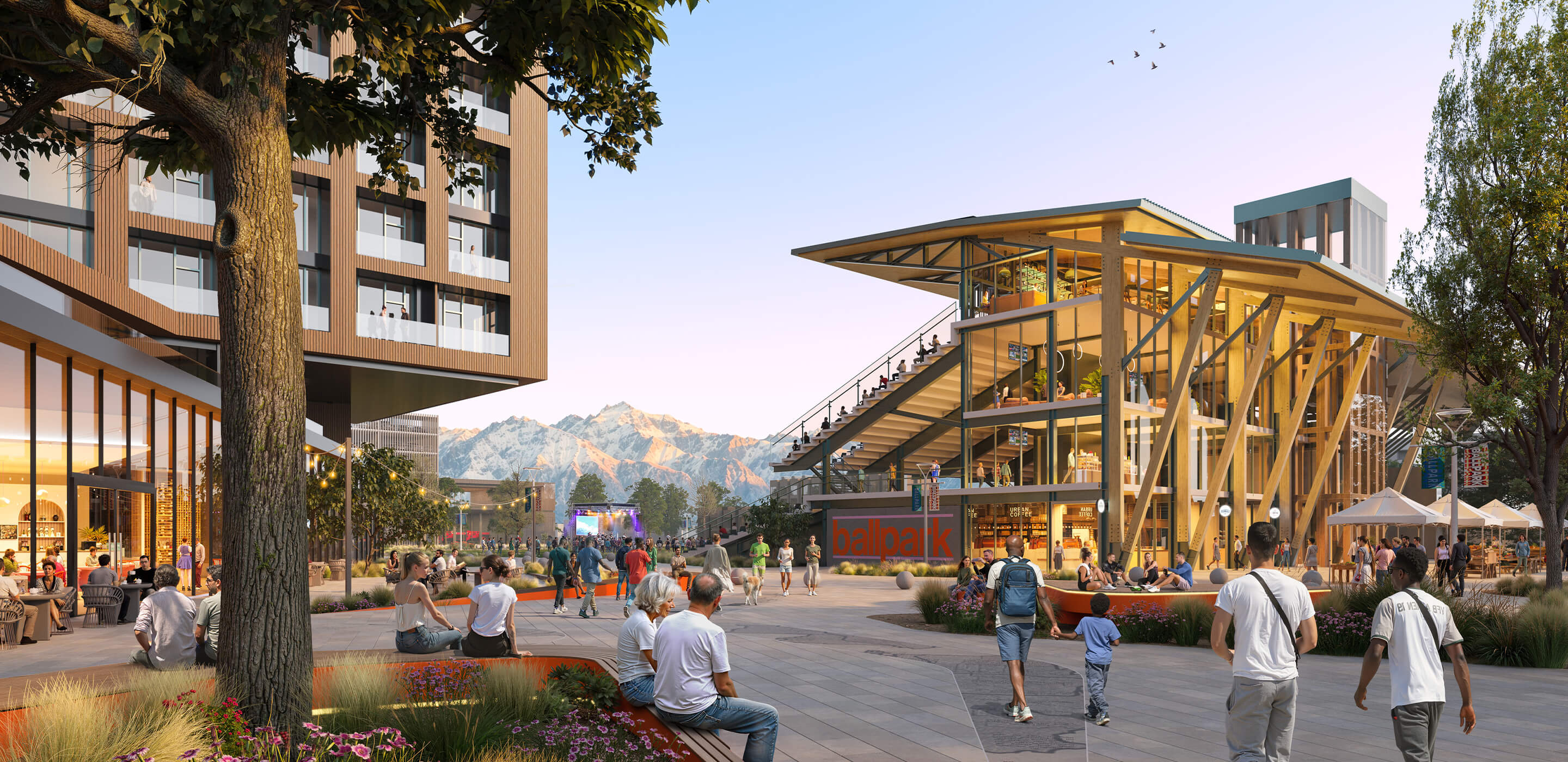 Modern urban plaza with people, wooden structures, mountain view in background.