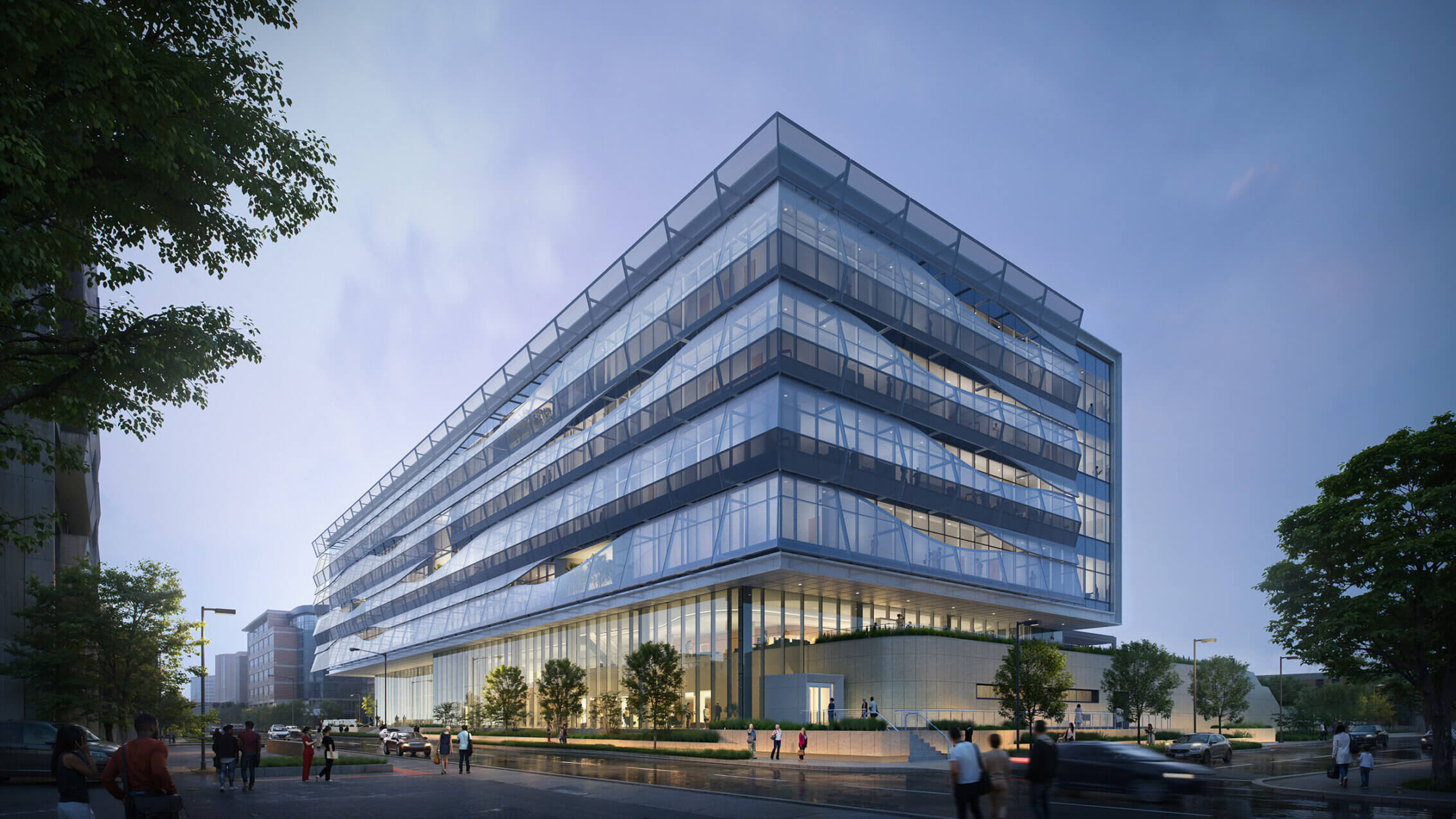 Glass building with a unique architectural design, surrounded by greenery and pedestrians, captured during twilight hours.