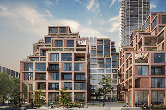 Residential building complex featuring multiple levels, large windows, terraces, and landscaping. Urban setting with people and trees visible.