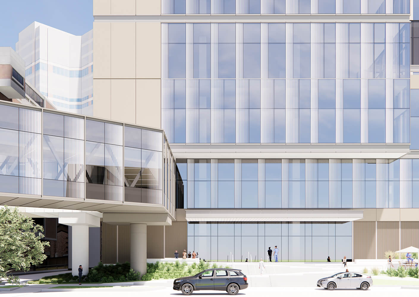 Facade of a building with large glass windows and vertical elements, featuring a landscaped entrance and people in the vicinity.