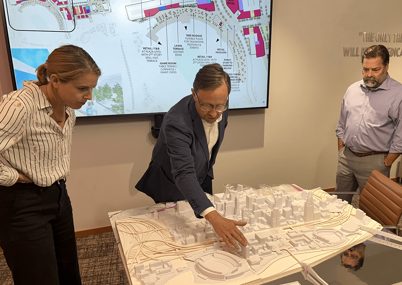 Team reviewing model of the The Banks in Cincinnati